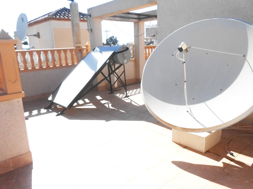 ROOF TERRACE WITH SATELLITE DISH AND SOLAR HOT WATER 